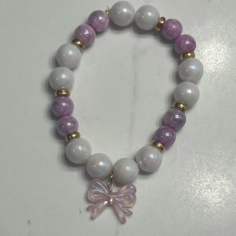 Elegant Pink and White Beaded Bracelet with Bow Charm